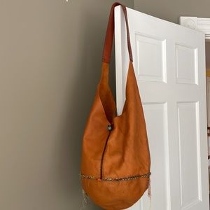 Fabulous Hobo bag, 100% leather, orange overtones.